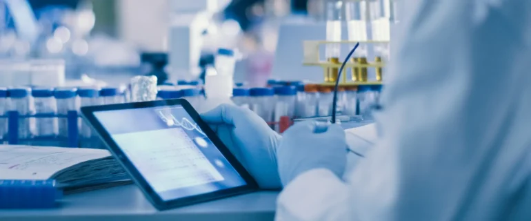 Scientist Working on a Tablet