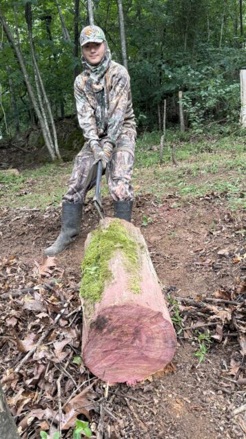 Luke Chopping a Log